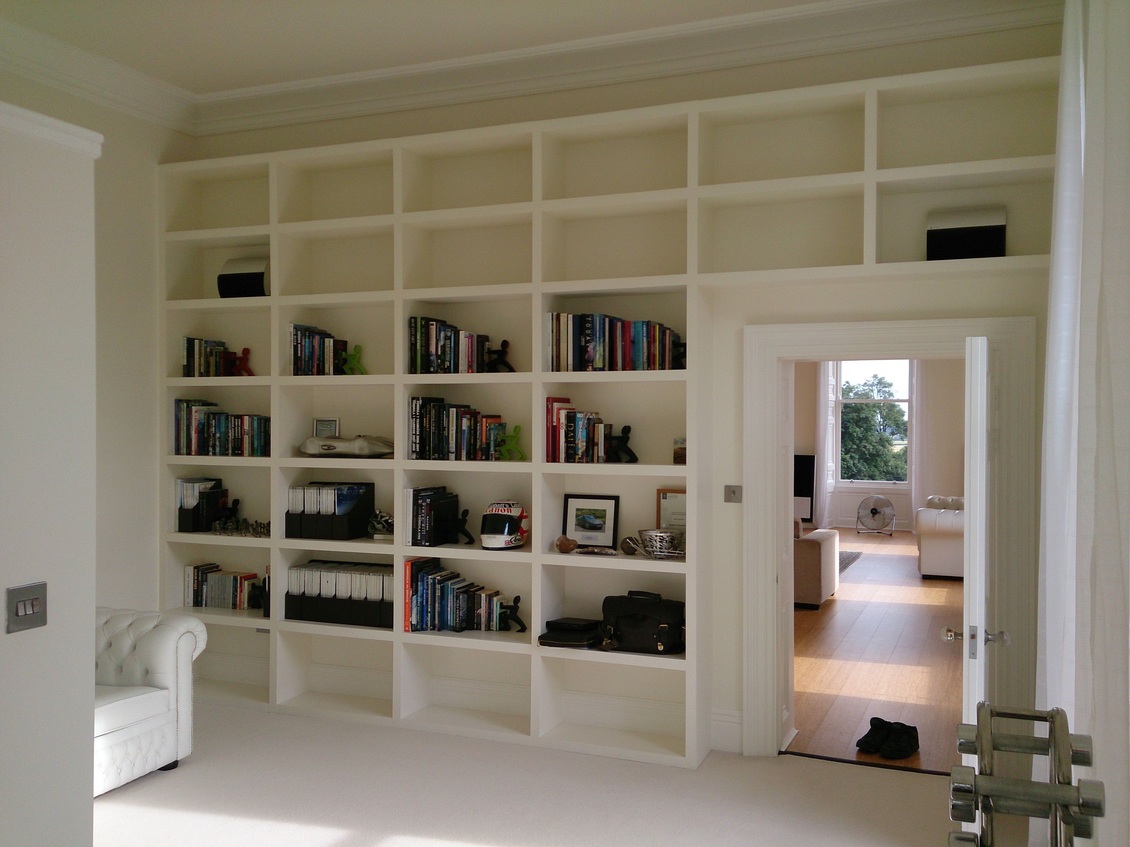 Fitted shelving construction