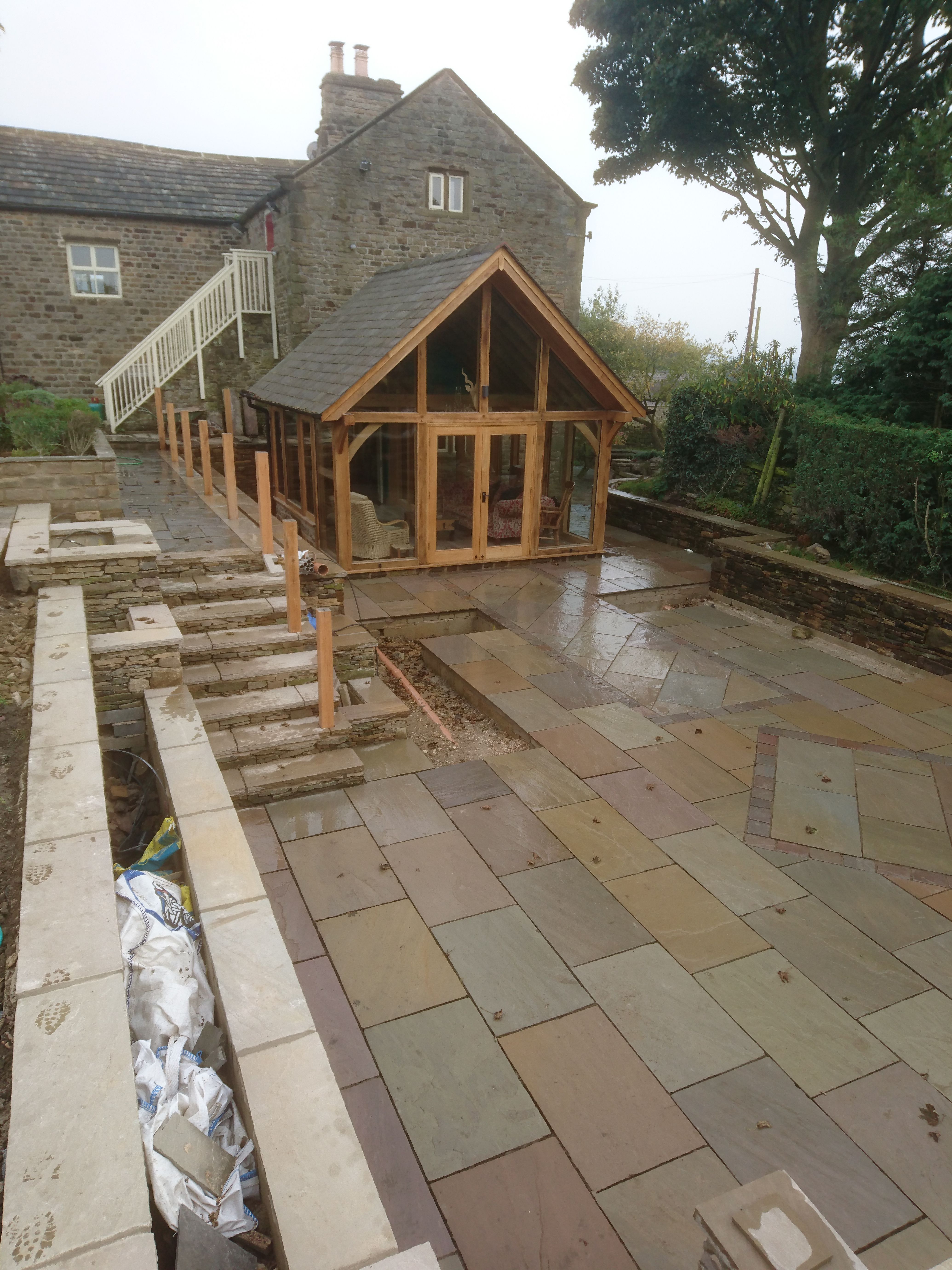 Listed building oak frame extension and landscaping (during)